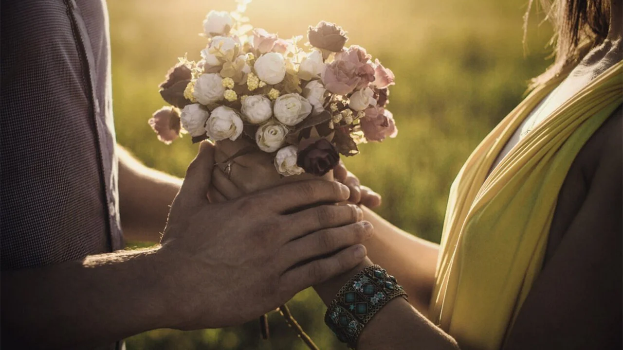 What do Christ's commandments call spouses to
